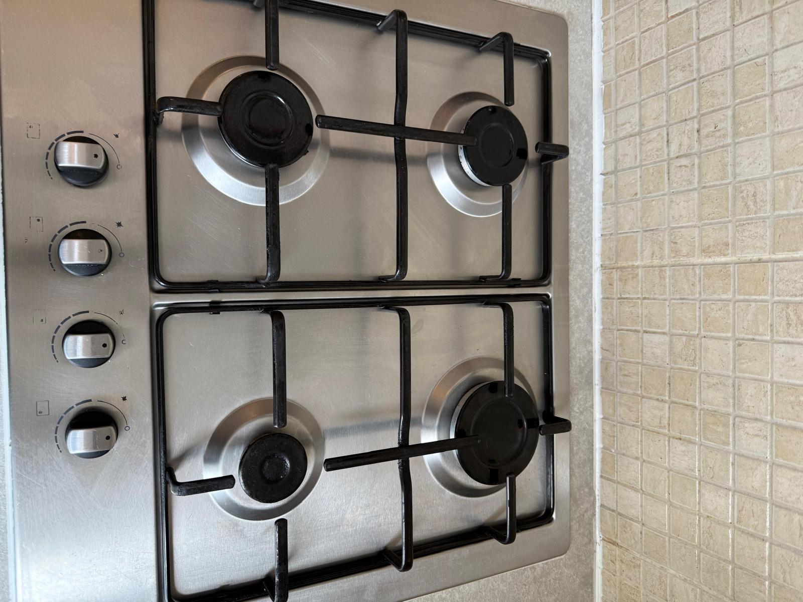 Oven door glass cleared after a full strip-down clean